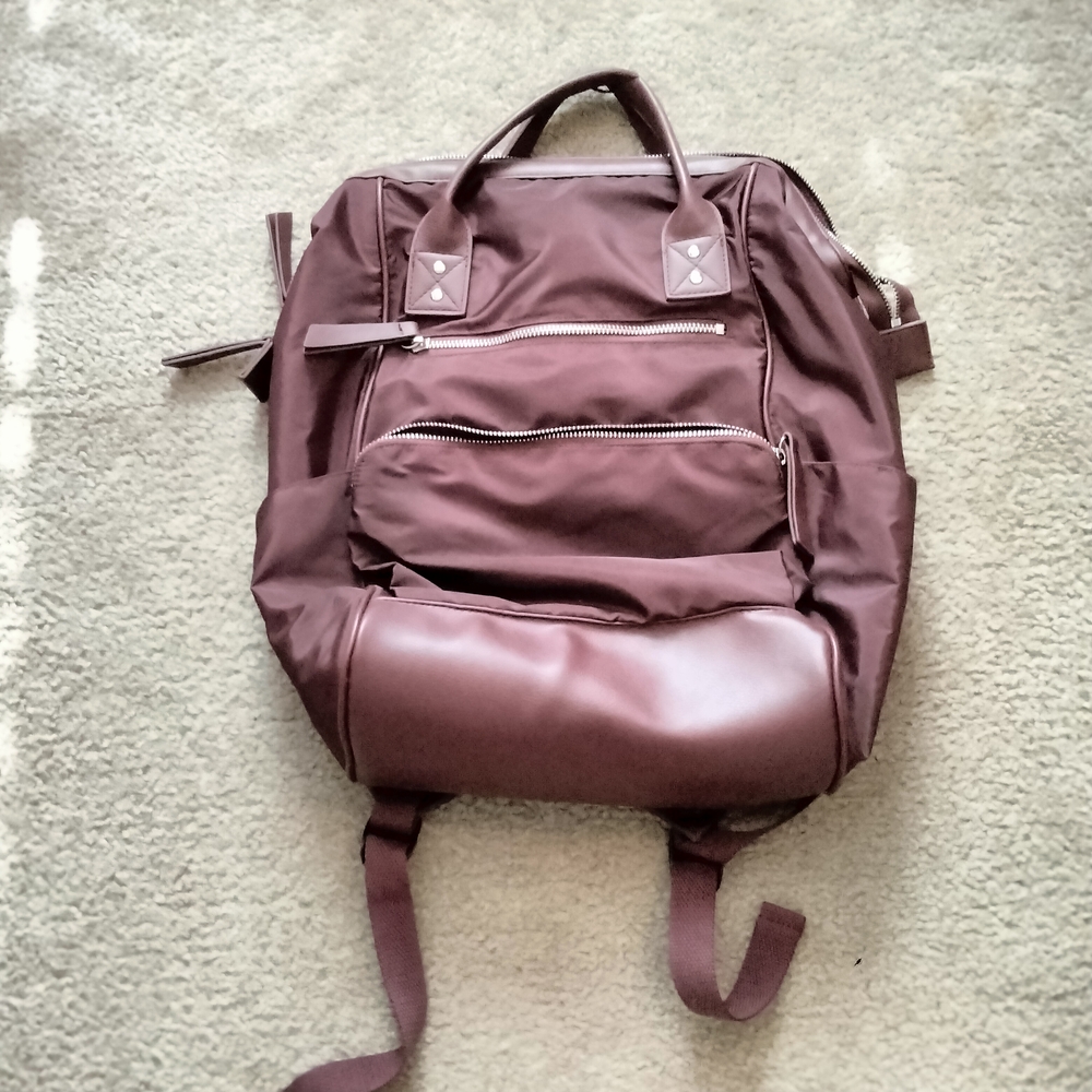 Brown Backpack with Adjustable Straps and Matte Finish